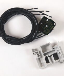 Coiled black multi-conductor cable with a small green electronic module, beside a gray plastic mounting bracket.