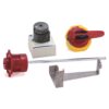Industrial electrical control kit with a red rotary switch, a yellow-toggle handle, a metal mounting bracket, and a long metal rod on a white background