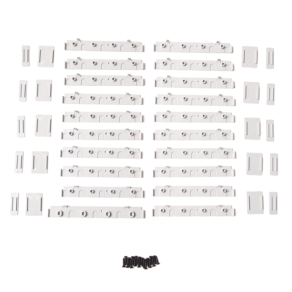 Assorted white plastic mounting rails, brackets, and caps arranged in rows with a small pile of screws below on a white background.