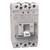 Three-pole molded case circuit breaker with toggle switch in the ON position, gray unit with labeled terminals and warning text.