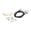 Wiring kit includes plastic mounting brackets, labels, and a long black cable with a small relay/connector assembly for appliance wiring.