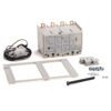 Electrical breaker unit with four terminal lugs and accompanying mounting frame, screws, and hardware laid out nearby (factory/kit components)