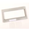 Silver rectangular metal frame with a large central opening and a small label slot at the bottom, looks like a name badge holder.