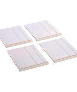 Four white square plastic tiles with two shallow grooves and an arrow mark, arranged in a cluster; likely tile spacers used in tiling.