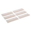Set of six beige plastic rail segments with arrows embossed, laid out on a white background