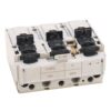 Three-pole circuit breaker module with three black toggle levers and gray housing, bottom terminals visible.