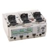 Three-pole miniature circuit breaker module with three black toggle levers and green labeling on a white housing.