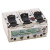 Three-pole electrical breaker/module with three black terminal clamps and a red test button on top, showing labeled rating strip on front
