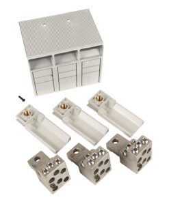 Three metal terminal blocks with screw terminals and three white plastic connector modules arranged around a gray modular enclosure, plus a small screw