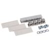 Assorted electrical terminal blocks and mounting hardware, including white plastic blocks, metal clamps, screws, and washers for wire connections.