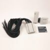 White industrial multi-pin connector kit with a long black cable and plug modules on a white background; includes a small wiring diagram card