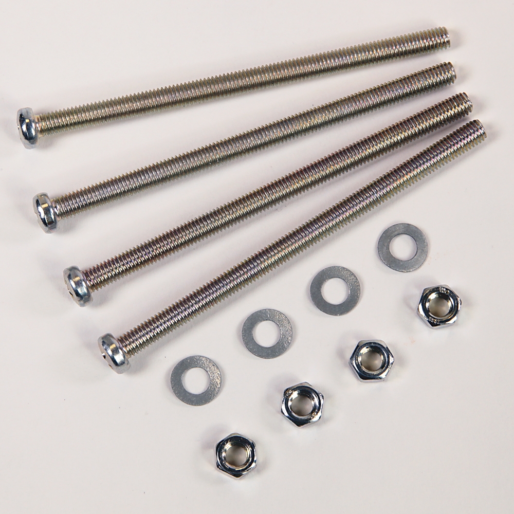 Assorted hardware: four long bolts with washers and nuts on a white surface