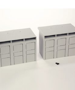 Two gray modular storage lockers with three doors each, placed on a white background; a small black screw lies in front.