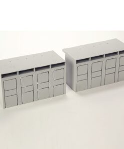 Two gray modular storage lockers (model) with vented tops on a white surface.