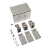 Three gray modular terminal blocks with metal connectors and accompanying mounting pieces laid out for assembly (screws, washers, plastic covers).