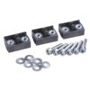 Three black plastic mounting blocks with metal threaded inserts, six screws, and six washers on a white background, ready for assembly.