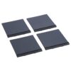 Four identical dark gray square plates arranged in a 2x2 grid on a white background, likely computer storage or mounting shims.