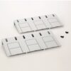 Two white modular wall plates with three rectangular sections and vertical slots, plus a few small screws.