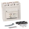 Circuit breaker with mounting accessories: screws, washers, and busbar connectors laid out next to a white miniature panel breaker tool kit.