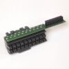 Green circuit board attached to a large black multi-pin connector housing with a row of female sockets and a separate 2xN header on top.