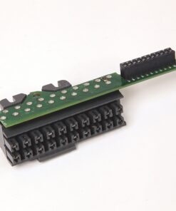 Green circuit board attached to a large black multi-pin connector housing with a row of female sockets and a separate 2xN header on top.