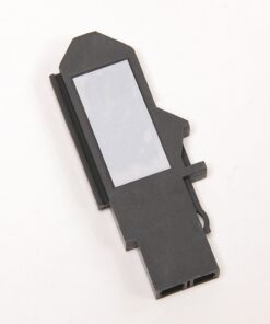 Plastic electronic component with a rectangular translucent window on a dark gray housing.