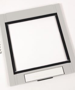 Gray square front bezel with an empty central opening, a row of screws to the left, and a blank label at the bottom.