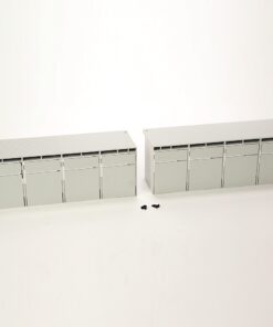 Pair of gray modular storage cabinets with multiple front panels on a white background; small screws sit between them.