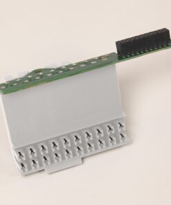 White plastic electronic module with a row of plug-in terminals at the base and a green circuit board with a black multi-pin connector on top.