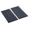 Two dark gray flat plastic panels laid side by side, each with raised ridges and small arrows for alignment.