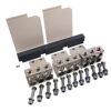 Industrial manifold or block kit with four silver aluminum blocks, a black spacer, and multiple bolts and screws laid out for assembly