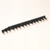 Black plastic pin header strip with a row of copper pins for PCB connections