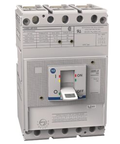 Industrial circuit breaker with a white toggle lever in the ON position and front-label markings, showing top terminal slots and brand logo