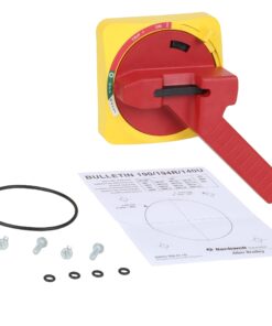 Close-up of a yellow panel-mount rotary switch with a red handle and an instruction sheet nearby. (informative)