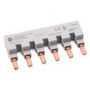 Six-position gray electrical terminal block with copper blade contacts, viewed at an angle from the side.