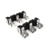 Six industrial relays with black housings and silver terminal lugs on a white background.