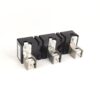 Three black electrical circuit breaker modules with silver terminal lugs lined up on a white background.