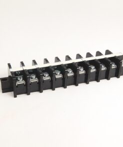 Row of black plastic screw-terminal blocks with metal clamps on a white background, used for wiring connections in panels.