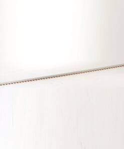 Long metal ruler with orange markings lying diagonally on a white surface, used for measuring.