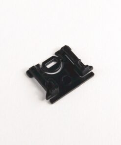 Small black LEGO Technic connector element with an axle hole and clip-like extensions