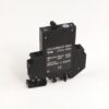 Black industrial relay module with terminal blocks and printed specifications on the front panel used for switching high voltages (277VAC/65VDC).