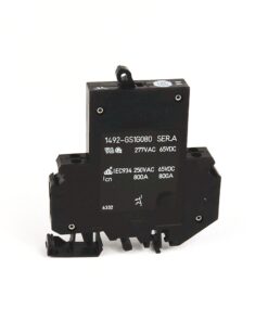 High-current relay/contactor module with terminal pins and rating labels (277VAC, 65VDC, 800A) for control panels