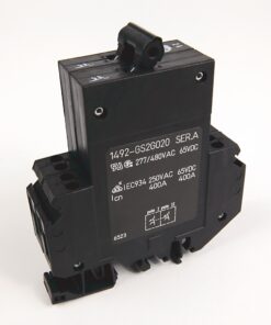 Industrial electrical contactor/relay with a black rectangular body and terminal blocks, shown at an angle with a coil on top.