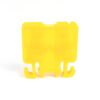 Bright yellow plastic device with a central block and curved hook-like feet at the bottom.
