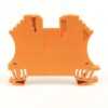 Orange plastic dual-terminal electrical terminal block connector with mounting feet, viewed from the front/back edge edge-to-edge symmetry.