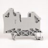 Grey DIN-rail terminal block with multiple connection ports and mounting holes.