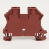 Red plastic terminal block with two top holes for screws and bottom mounting feet on a white background.