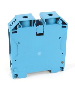 Blue plastic two-position terminal block module with screw terminals, viewed from the side in an industrial setting