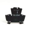 Black plastic electronic component with a small circuit diagram and the label 1492-JD3RB, standing on tiny feet pieces for mounting.