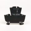 Black plastic electronic component with a small circuit diagram and the text '1492-JD3RB' printed on it, four leg-like supports at the bottom